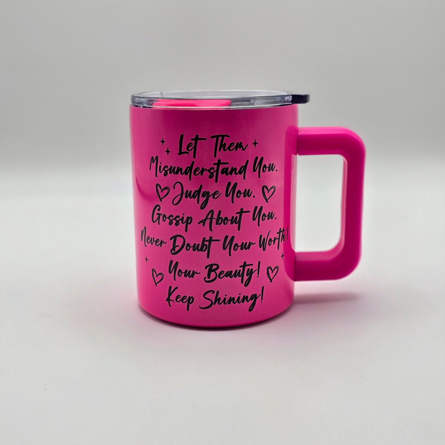 Pink mug with text on a white background