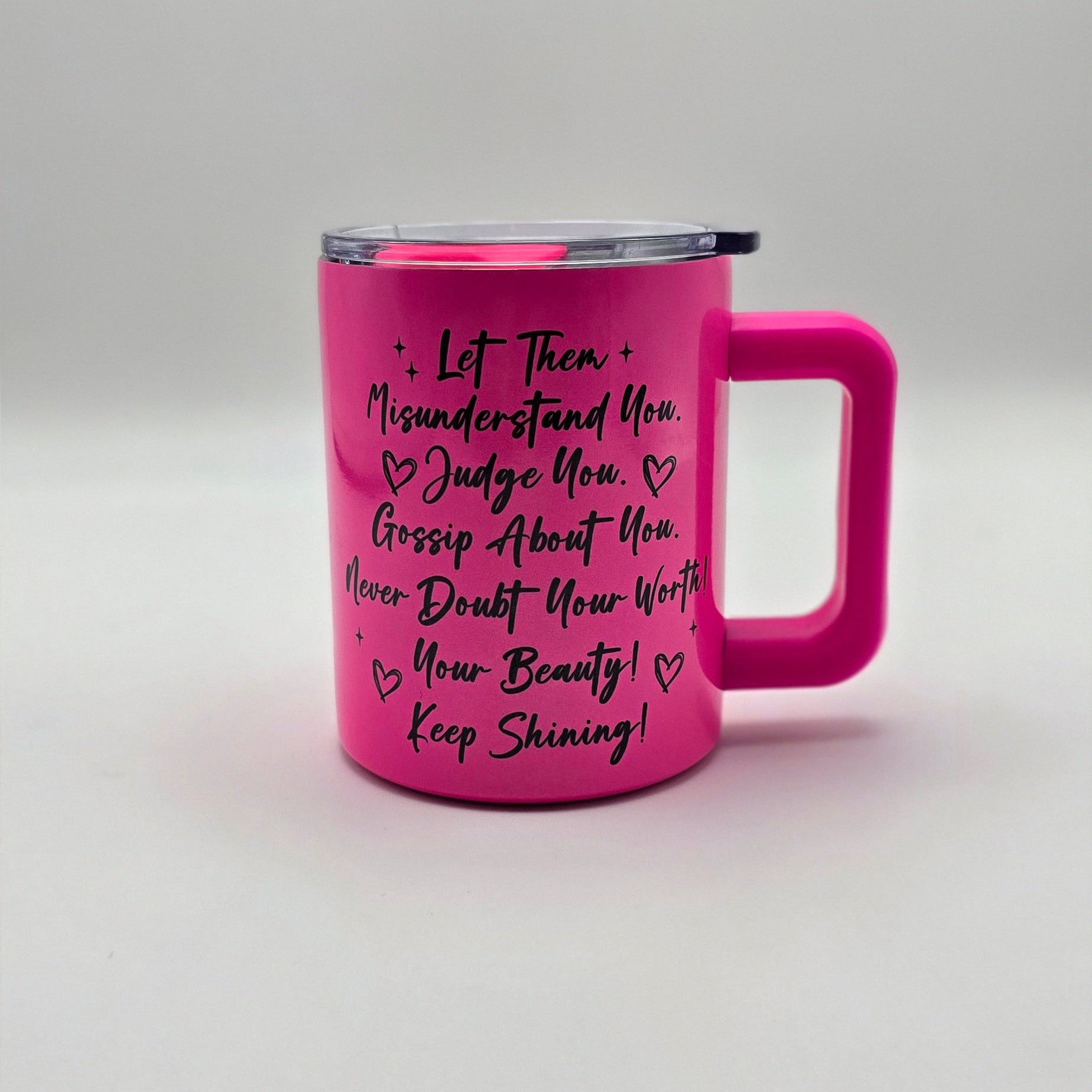 Pink mug with text on a white background